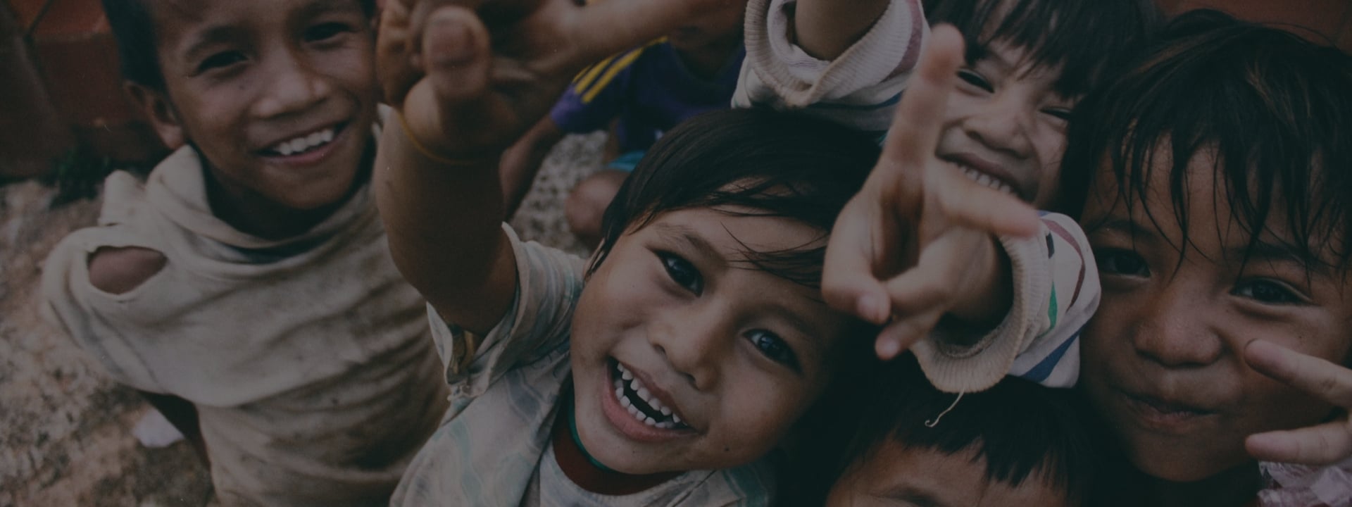 Happy children playing together outside, showing joy and friendship